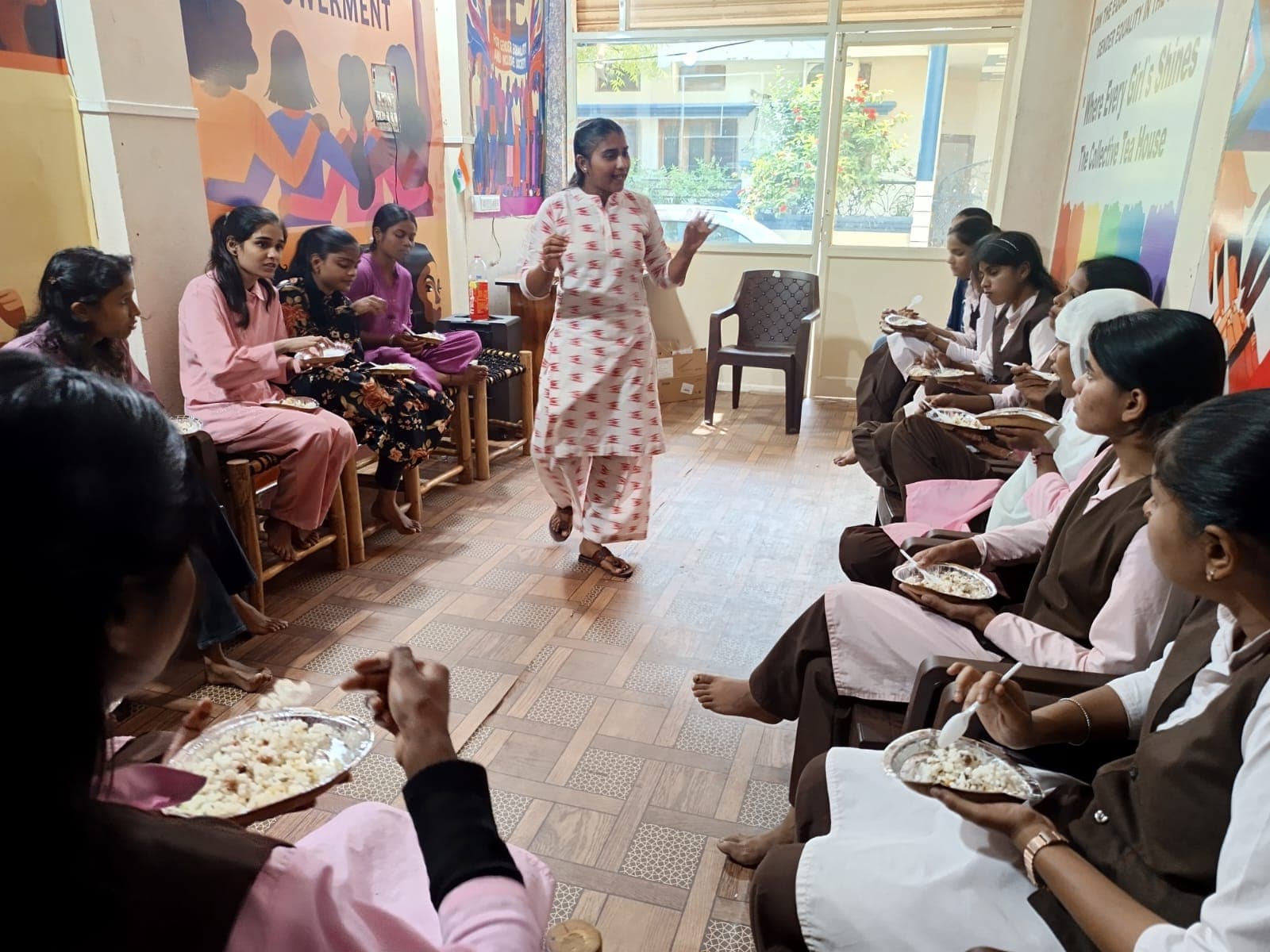 Girls and young women participating in a shared conversation space